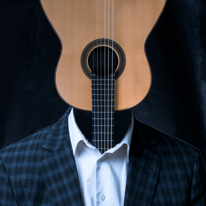 surreal image with man and guitar